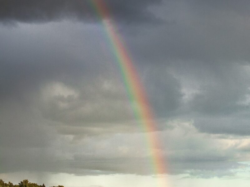 A rainbow over the harbor after a storm